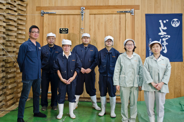 Sake brewing workers at Rokka Syuzo brewery
